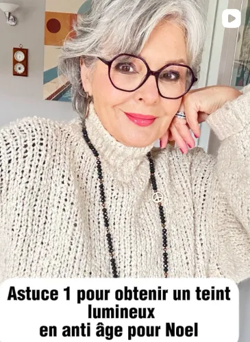 A grey-haired influencer filming a skincare tip, captioned in French as tip one for a radiant complexion