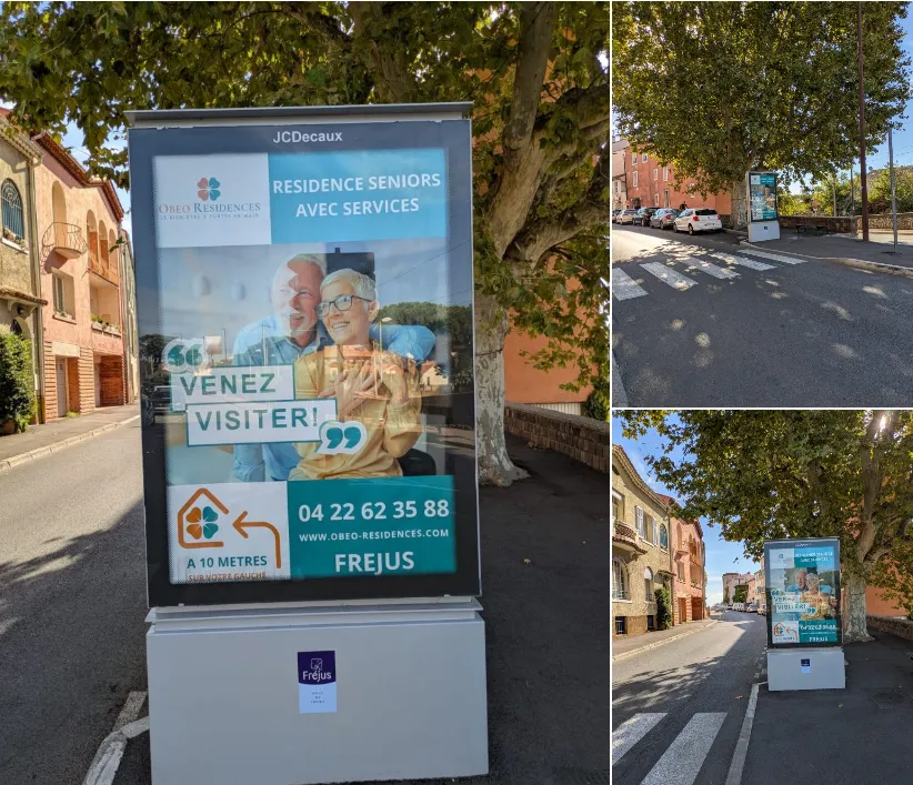 Un panneau publicitaire de rue vantant la résidence de Fréjus, au bord de la route qui mène au centre